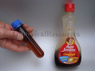 Tubular Flask being used to hold syrup for a food kit.